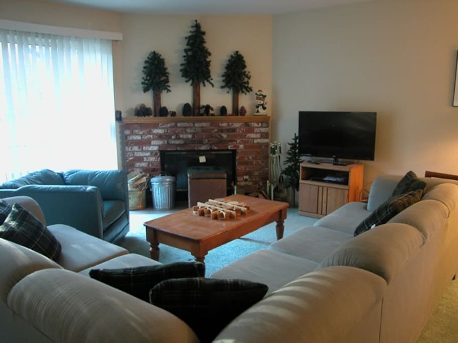 Living Room w/Wood Burning Brick Fireplace