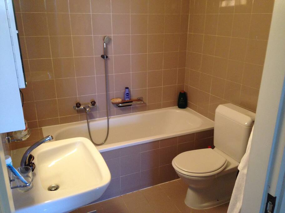 Private bathroom with bathtub