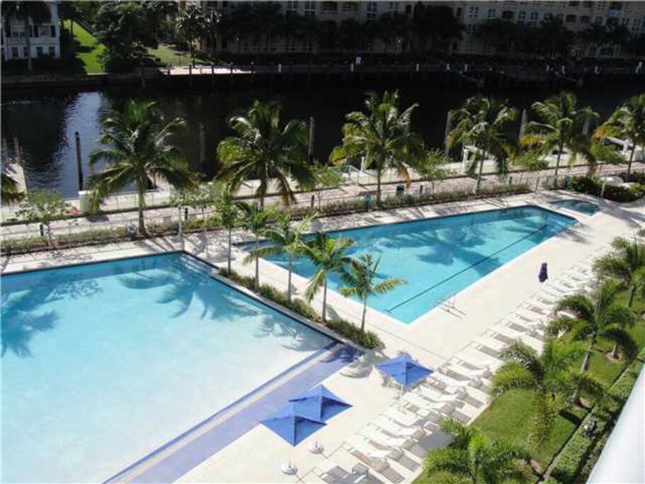Two swimming pools and pool deck