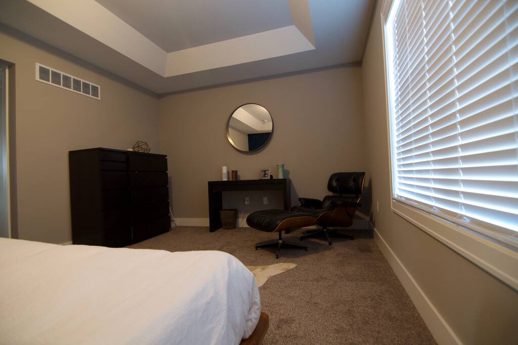 Huge master suite with authentic Eames Lounge