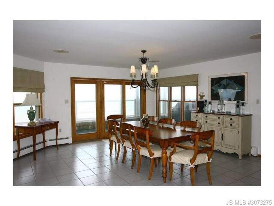 Kitchen table seats 12 ,additional seating at counter