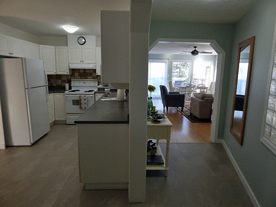 As you come in the front door spacious entry and view of both kitchen and living area