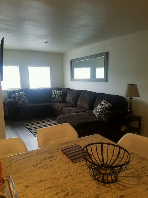 Open kitchen, sitting, and dining areas