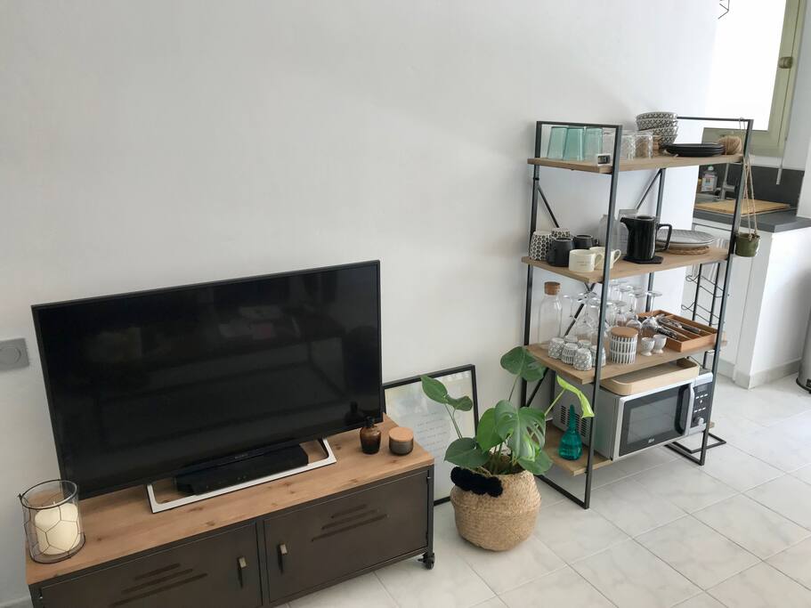 The living room clear and spacious, and the TV
