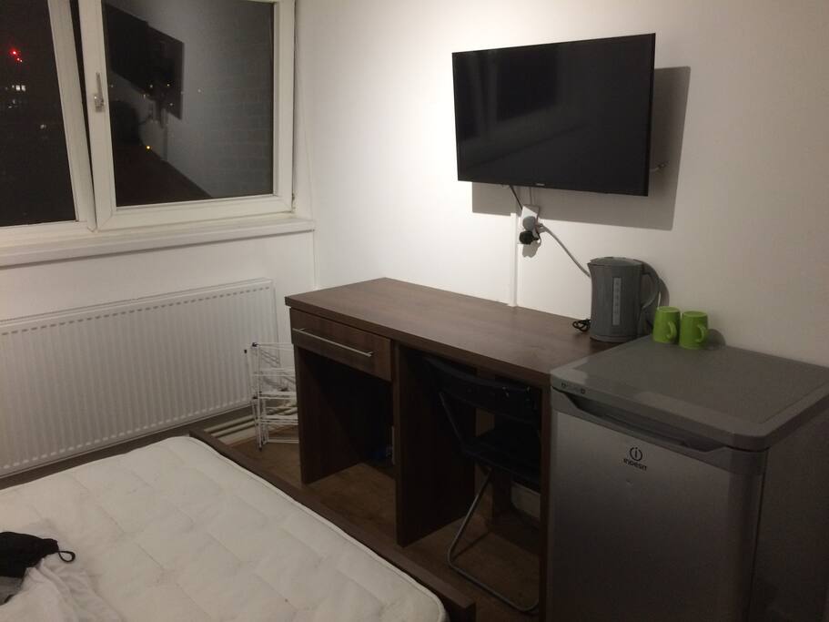 Smart tv, fridge for your use and 'breakfast bar'