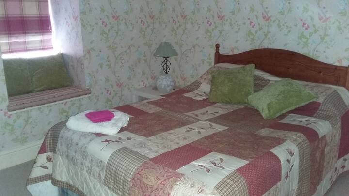 Chambre avec lit double