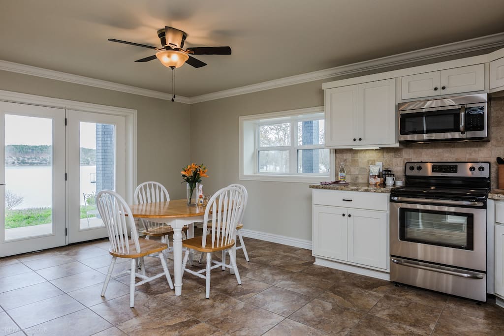 Kitchen where you will find a coffee maker, fresh coffee and tea, and granola for a quick breakfast before playing on the lake
