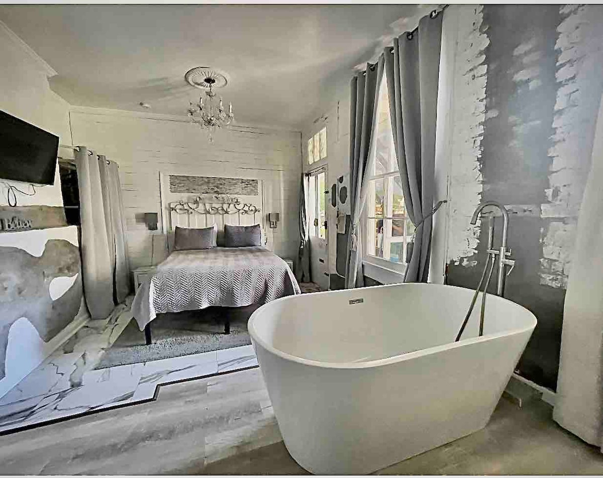 Red Room first floor, private entrance. Large shower with  7  showerheads &  built-in TV shower. Dual vanity, smart direct tv 