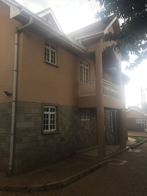 An outside view of the balcony and one of the entrances (below the balcony)