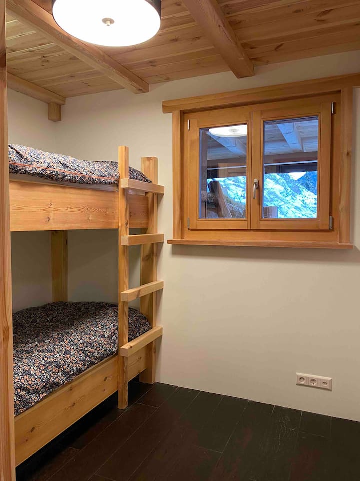 Bedroom 3, small bedroom with bunk bed, closet and mountain view!