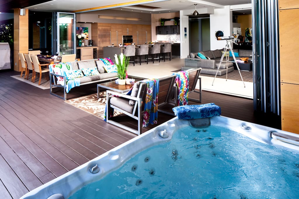 Deck and Hot tub and great room in background
