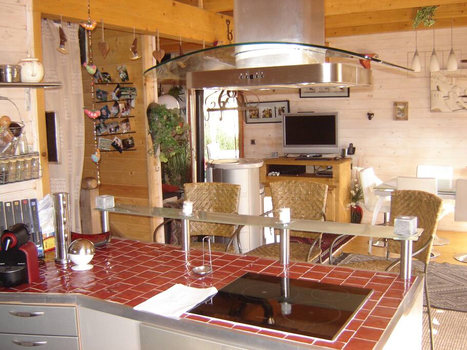 CHALET - View of the lounge and dining area from the kitchen (all open plan).