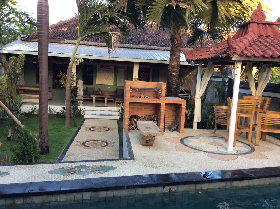 Pool area all new and lovely BBQ for those who like cooking on the fire