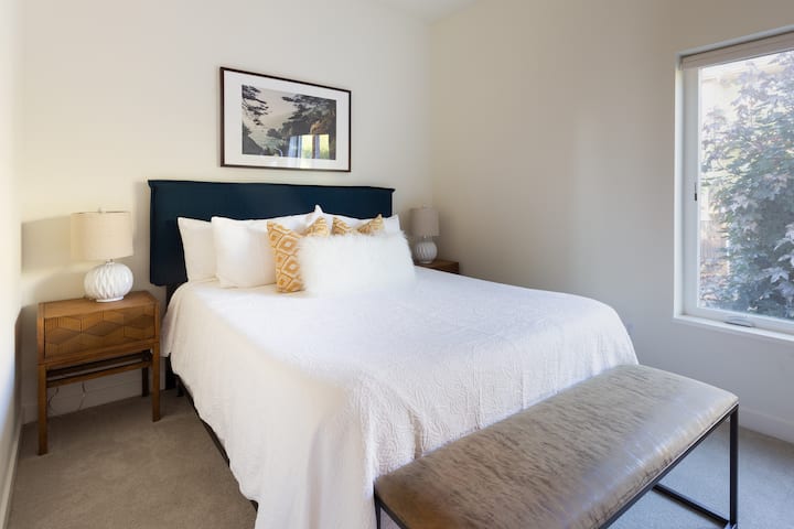 Bedroom on the main floor. The bed is a comfy memory foam queen.