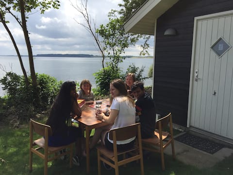 Lovely cottage on the beach 180 degree sea view.