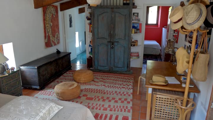 2nd House: Bedroom 3 with a double bed, bathroom on the left + bedroom 4 on the right