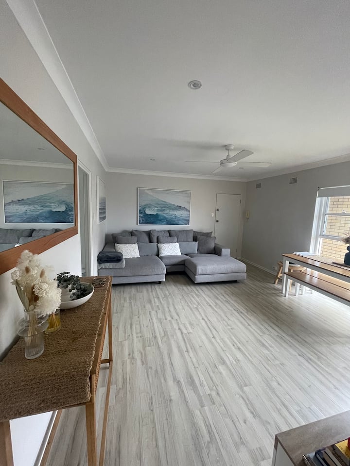 Modern beachside apartment with water views.