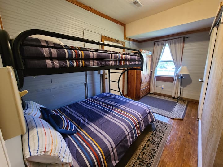 Bedroom 2 with pyramid bunk (twin over double bed - sleeps 3)