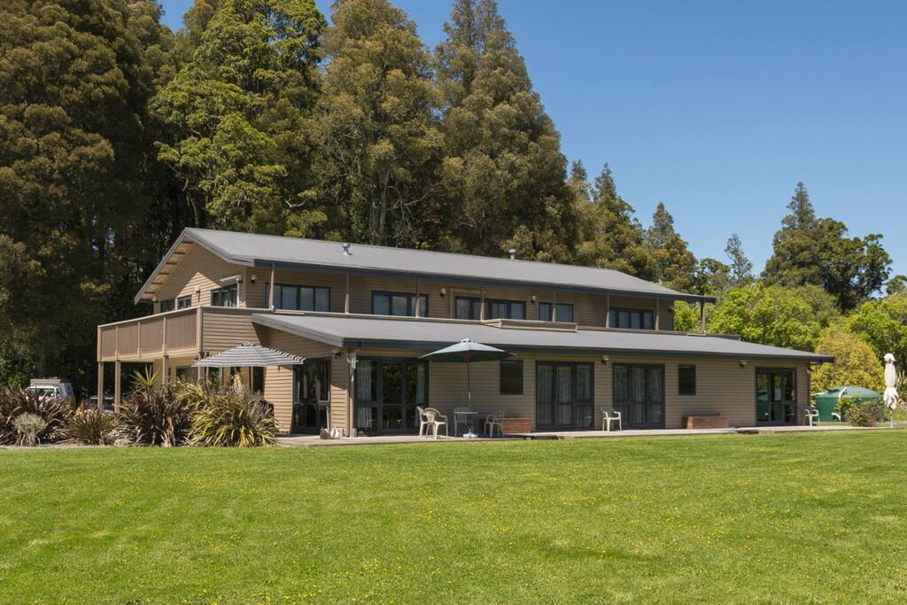 Apartment on lower right hand side. Double doors from lounge and bedroom out to patio and lawns.