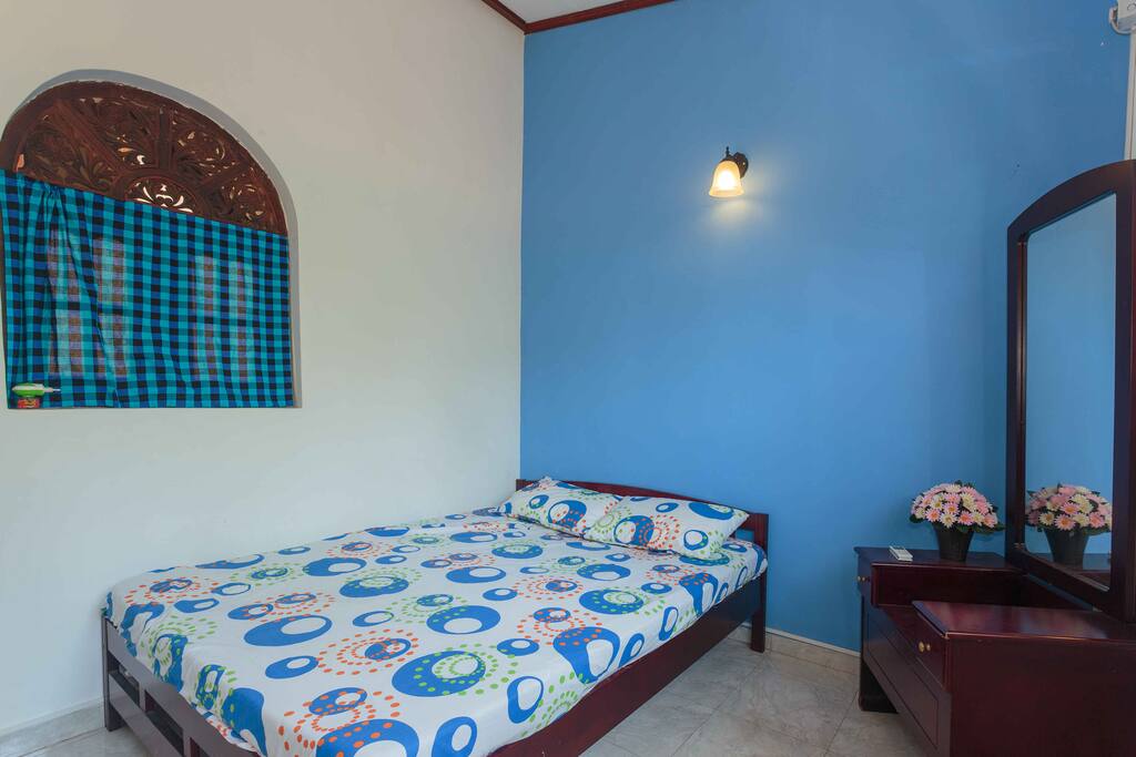 Guest bed and the mirror