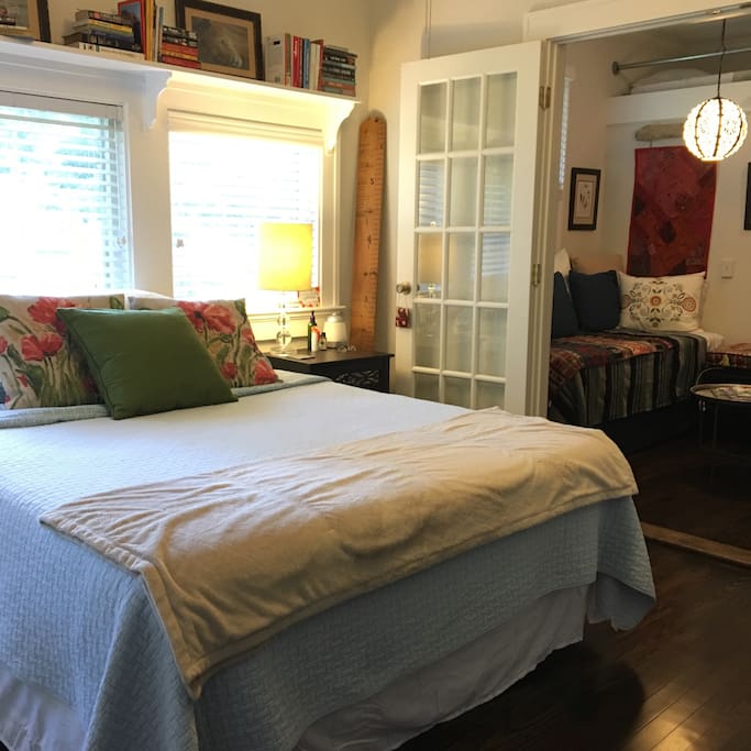 Master bedroom with king bed (twin bed in background)