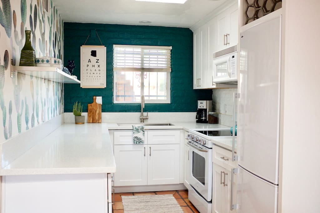 Fully stocked kitchen with everything you need to make great meals! Includes coffee maker, pots and pans, baking dishes, cutting boards, cutlery that actually CUT, wine glasses, coffee mugs, toaster, teapot, hand towels, Magic Bullet blender and much more.