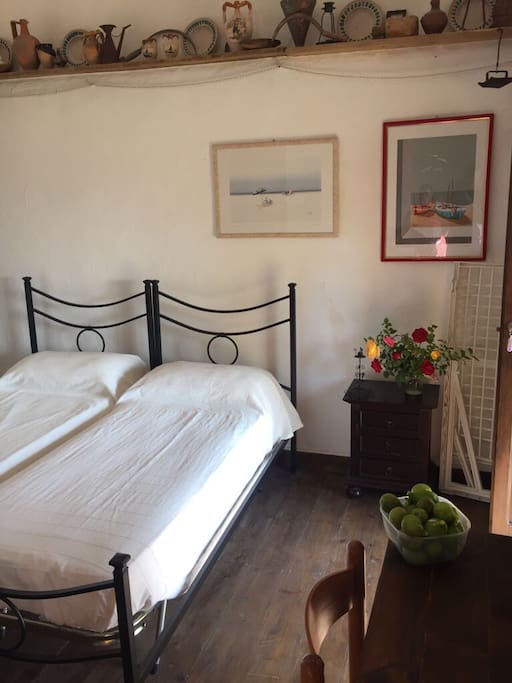 the first bedroom with balcony and ensuite bathroom