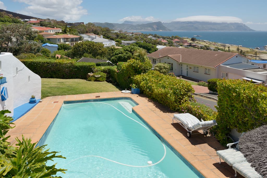Large swimming pool with garden & braai area.