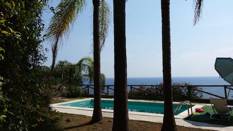 Relax with a private pool and sea view