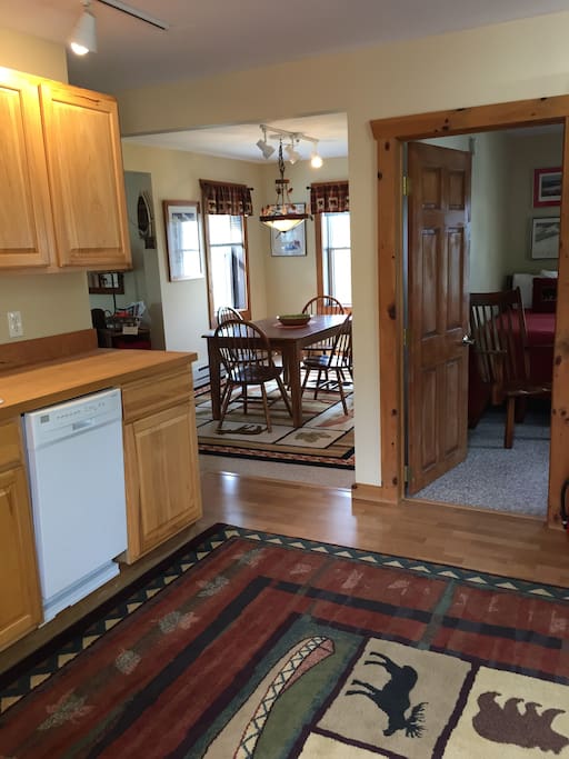 View of dining room and twin bedrooms from kitchen
