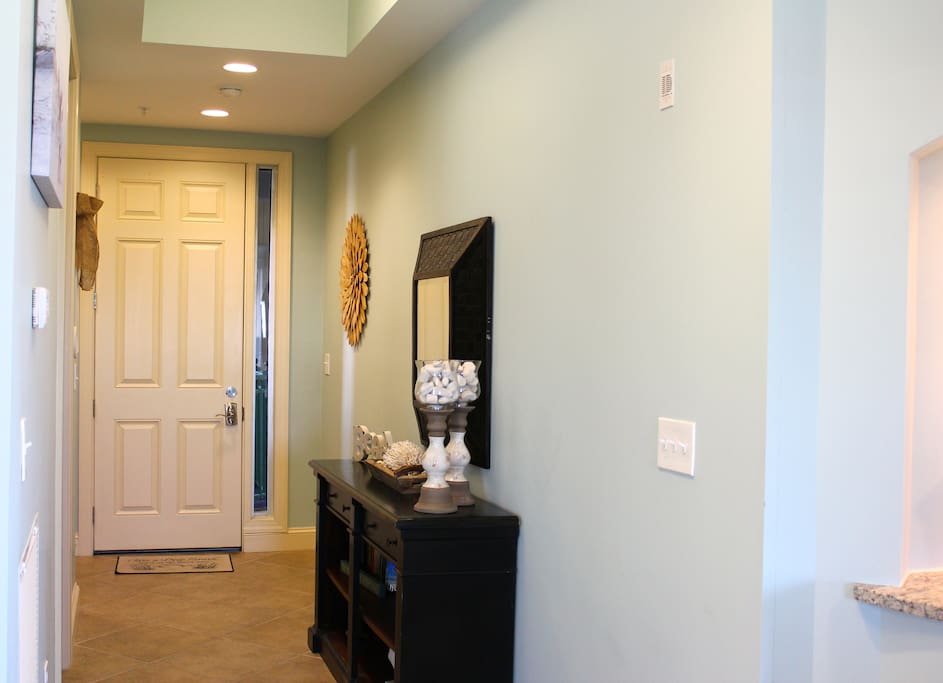 Large entry with 10 foot ceilings throughout gives the condo an open feel.