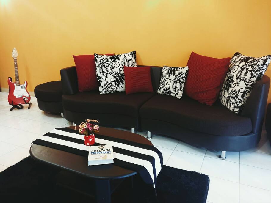 Welcome to our cozy living room. The chill couch is a popular hangout ️