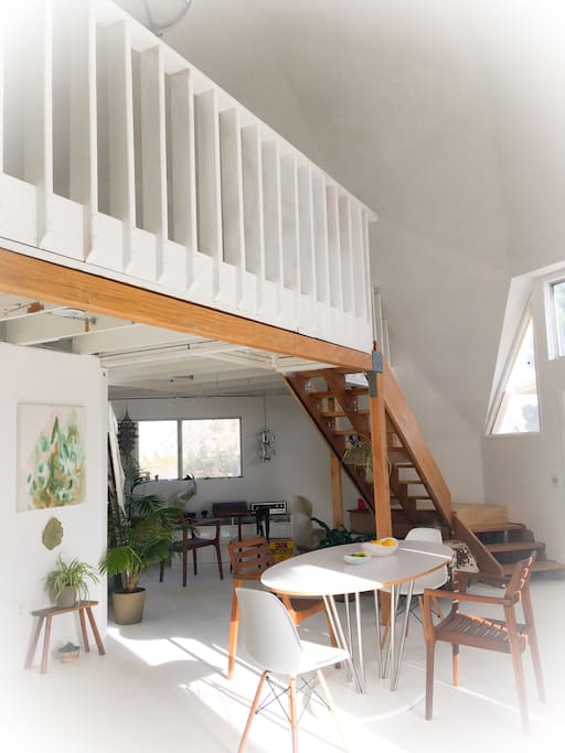 Soaring 20 ft ceilings, interior dining area and music alcove