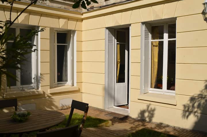 Flat with private garden located in a guest house