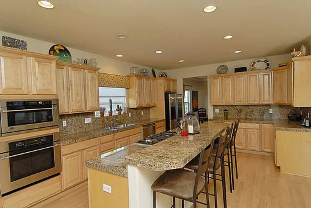 Kitchen with eat in bar.