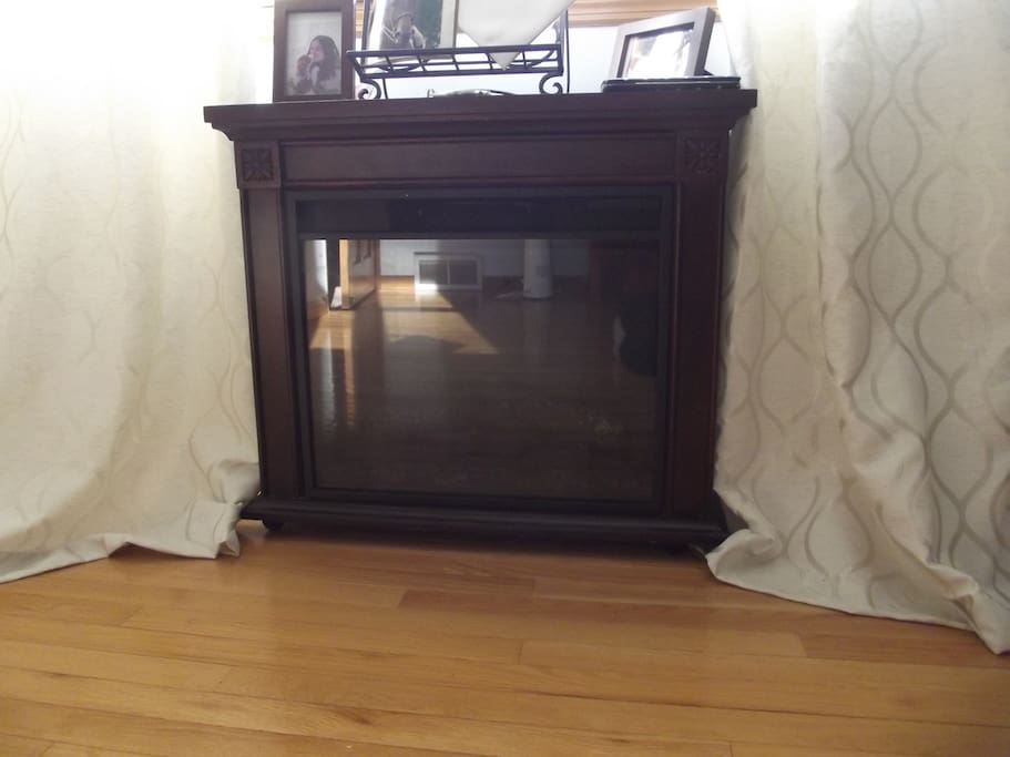 Tranquility room has its own electric fireplace Easy on/off and timer for a lovely evening mood