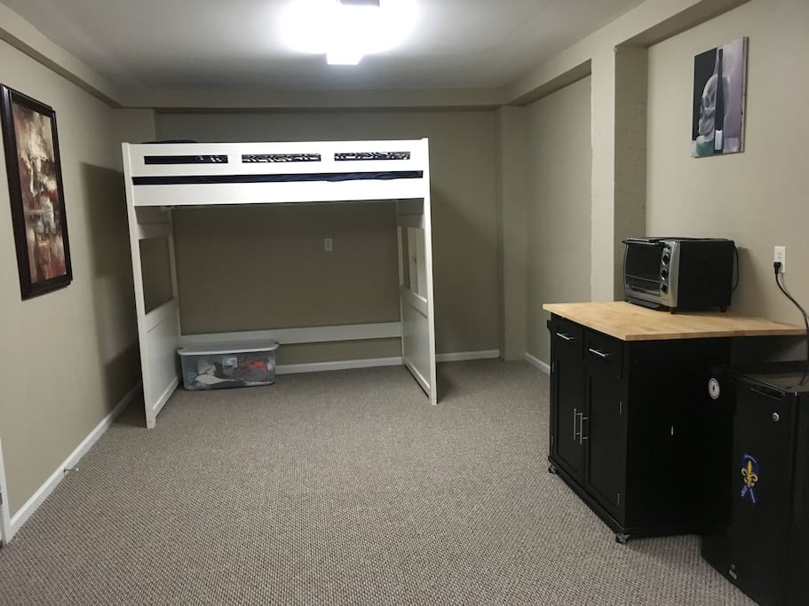 As you enter to the right. Kitchenette and loft bed -- great for kids!