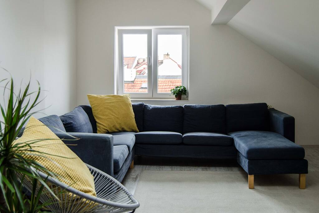 Living room with views of Jewish Quarter rooftops.