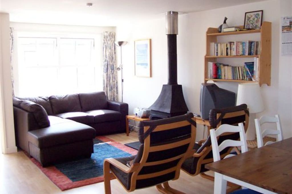 Living area with wood burning stove.