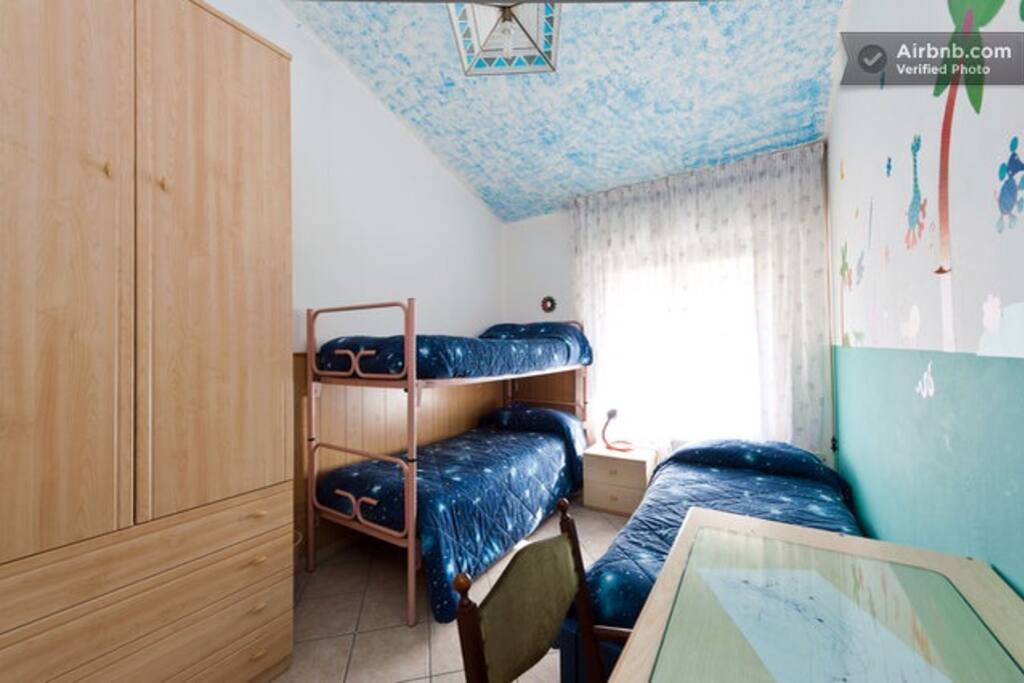 Our three beds room