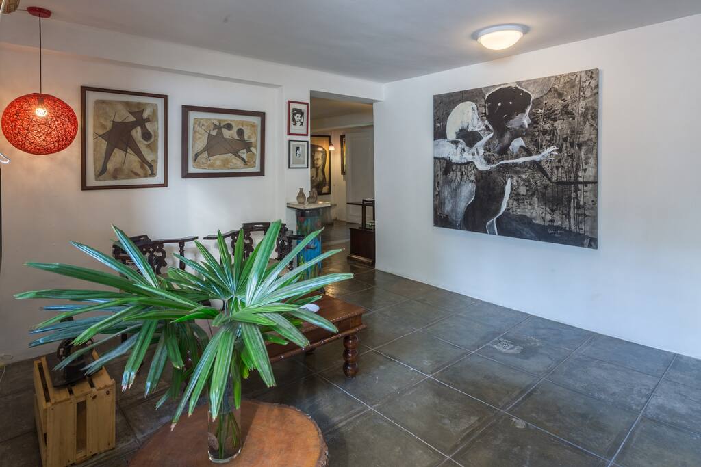 Welcome home! You could put your bags down here and walk towards the kitchen as you go by the living room.