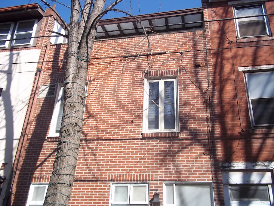 One of the many special features of this apartment is that is has a lovely 3rd floor level deck overlooking the street.
