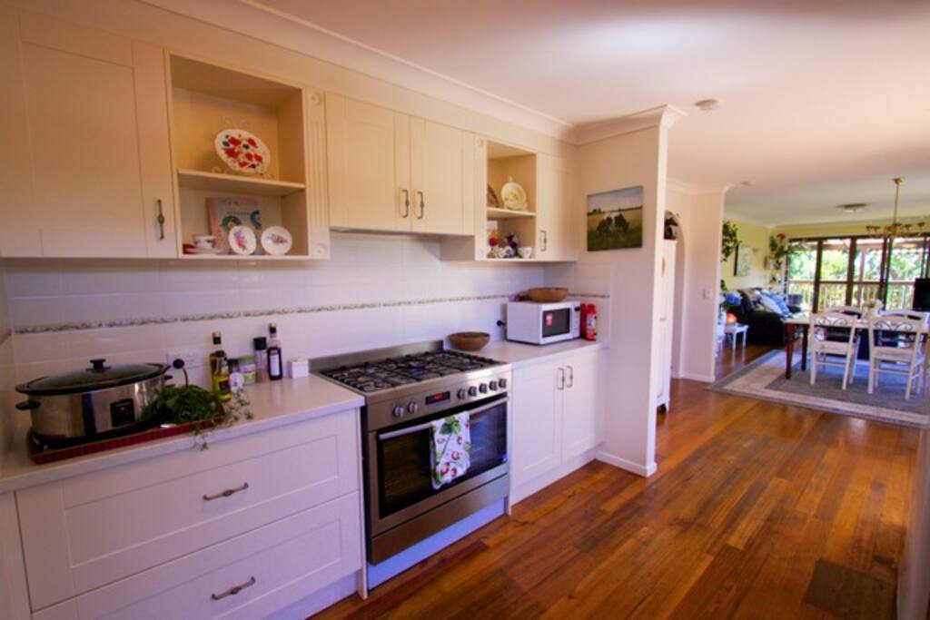 Inside my kitchen looking down to my guest lounge and private deck for my guests.