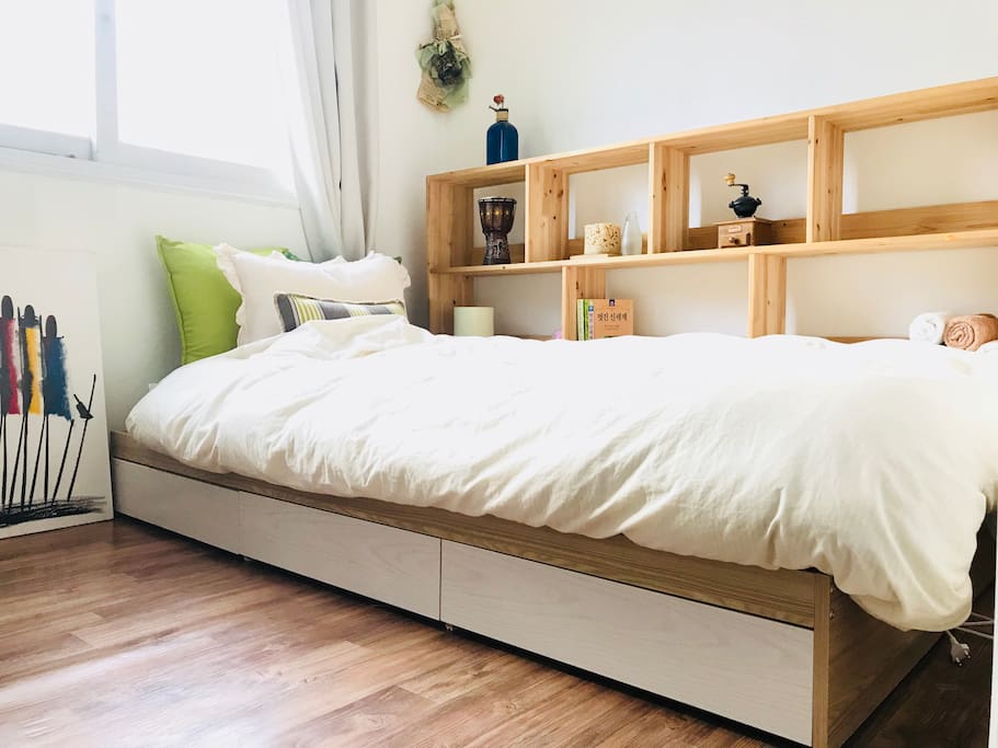 A bed frame with storages(for long-term guests)