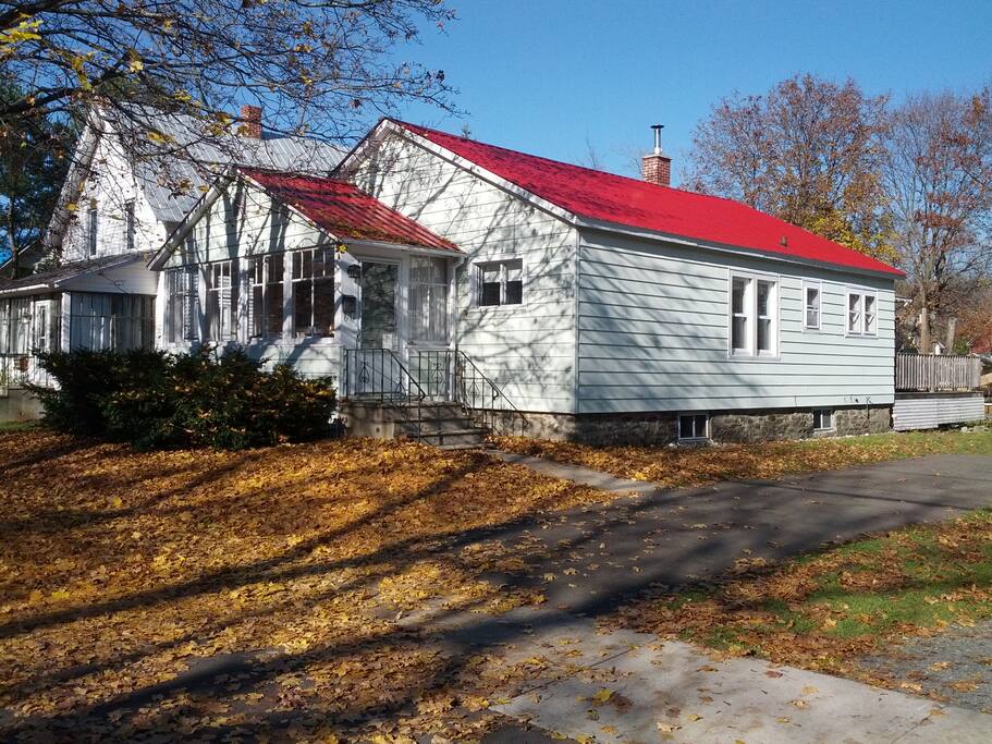 Delightful front porch , ample parking