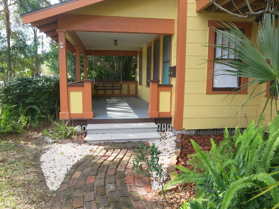 Brick pathway from driveway to front porch.