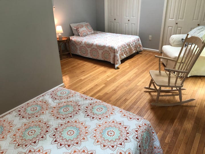Two full-sized beds located upstairs facing the rear of the house. 