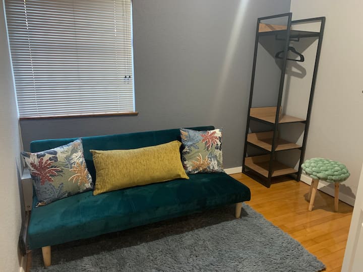 Bedroom 3 with sleeper couch and single bed for an extra guest. Ironing board and iron available here as well.