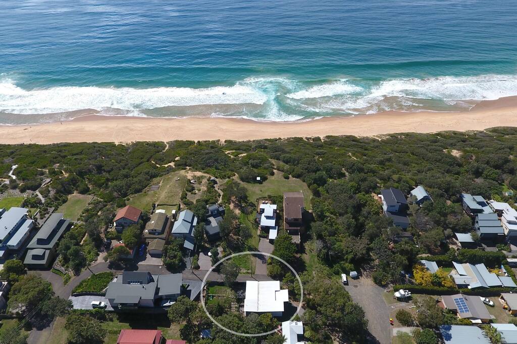 Only a minute walk to the sand and surf