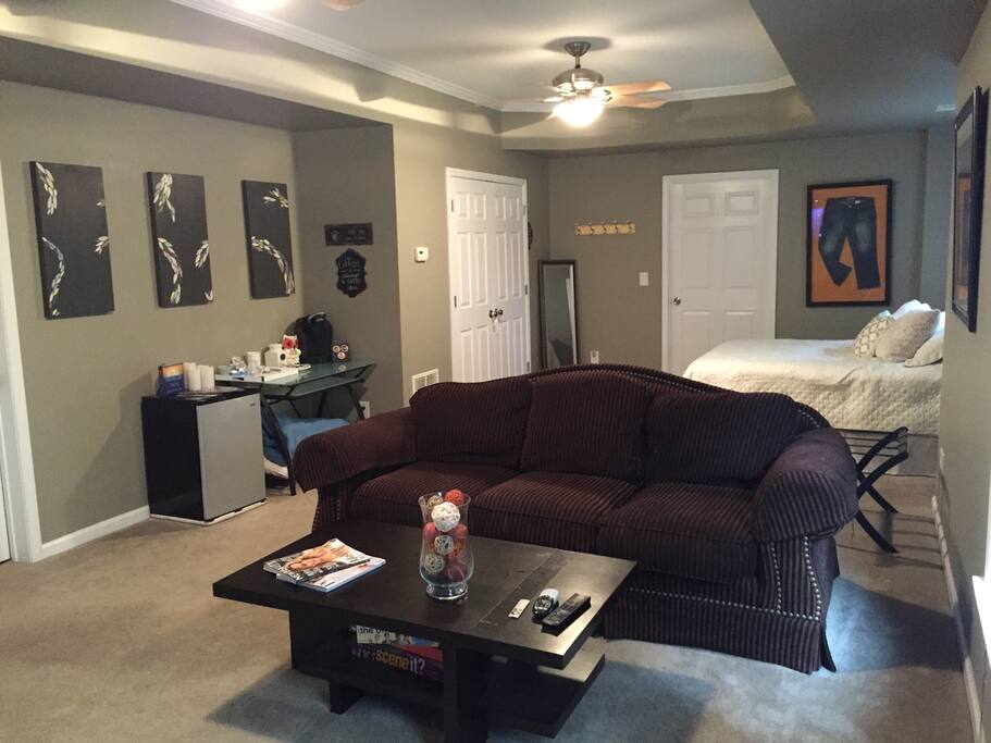 Living space, with small coffee station and mini fridge.